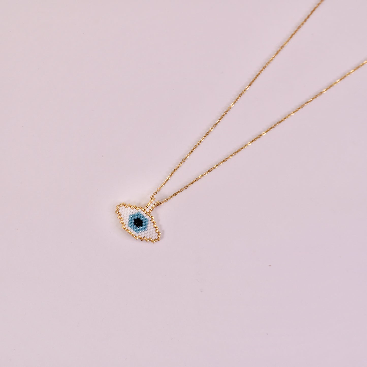 Aaliyah: Beaded evil eye pendant 🧿